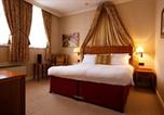 The Mad Hatter Hotel